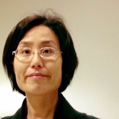 A headshot photo of Bohyun Kim with a blank wall as the background.