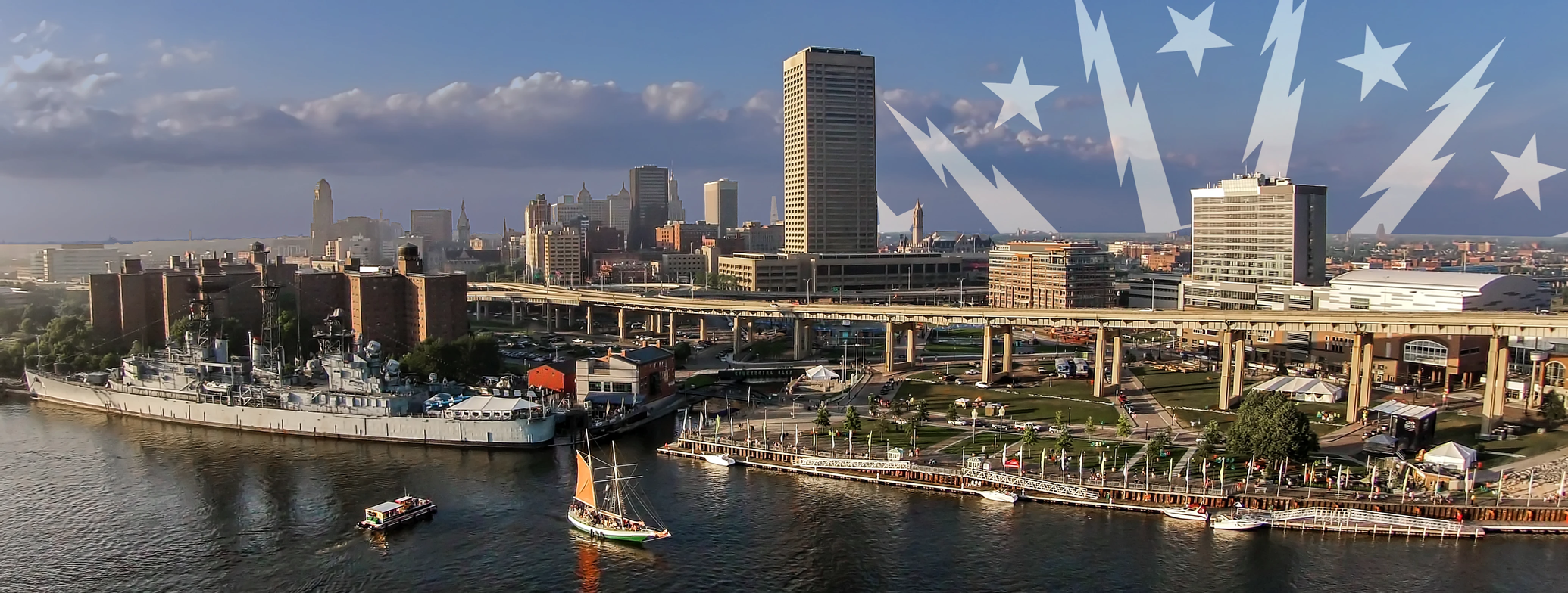 The skyline of Buffalo, New York. White lightning bolts and stars are in the background, representing the Buffalo city flag.
